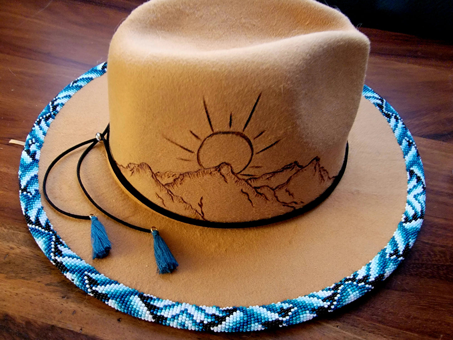 Excited to share my latest finished beaded hat. 
Take me to the mountains! 
Handbeaded brim with approximately 20 hours of beading. 😍🤩
Teal / blues but available in any custom ordered colors. 
$200.00 plus shipping 
Hat and matching earrings $240.00

#f