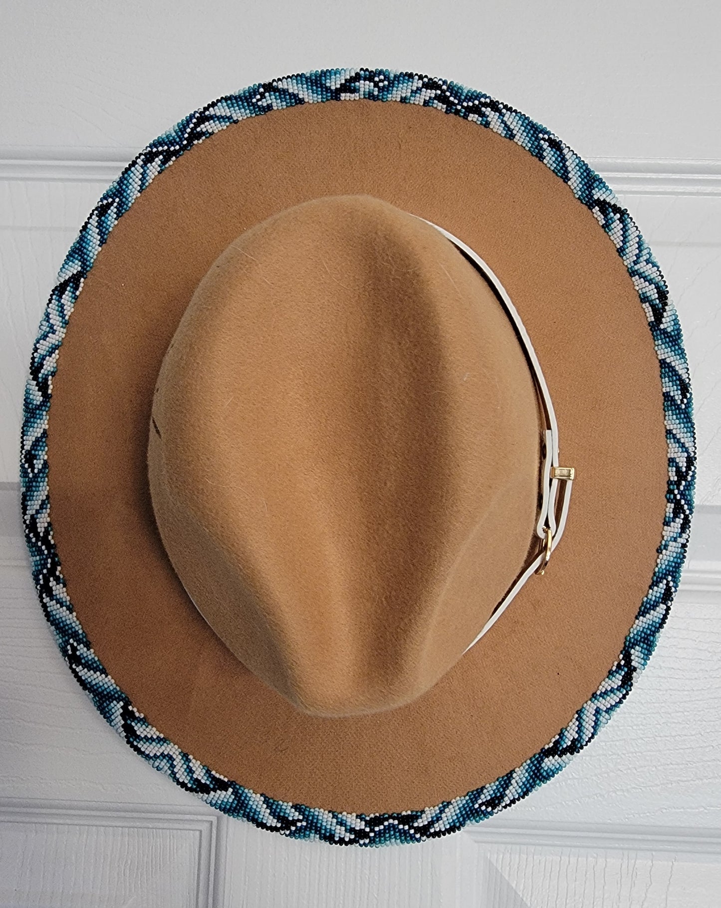 Excited to share my latest finished beaded hat. 
Take me to the mountains! 
Handbeaded brim with approximately 20 hours of beading. 😍🤩
Teal / blues but available in any custom ordered colors. 
$200.00 plus shipping 
Hat and matching earrings $240.00

#f