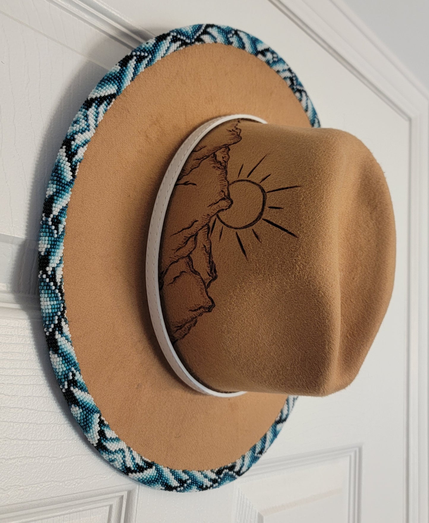 Excited to share my latest finished beaded hat. 
Take me to the mountains! 
Handbeaded brim with approximately 20 hours of beading. 😍🤩
Teal / blues but available in any custom ordered colors. 
$200.00 plus shipping 
Hat and matching earrings $240.00

#f