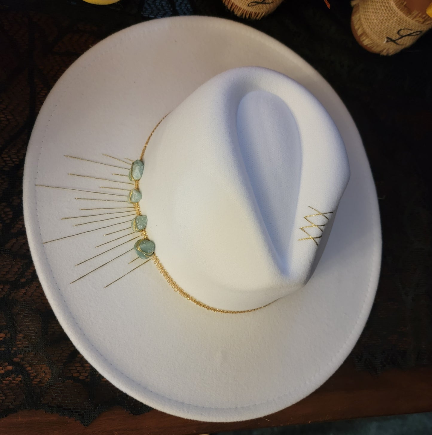 White fedora green aventurine crystals