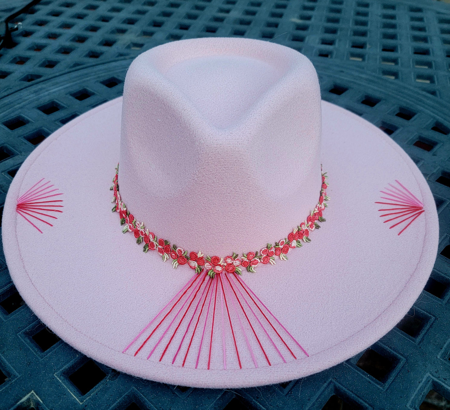 Pretty in Pink. 🩷 
Pink fedora hand embroidered with pink highlights. Pink floral band with butterfly pin accent on the back. 
$100. This would also make a cute mommy and mini set! #prettyinpink #pinkfedora #handembroideredfedora #pinkfedora