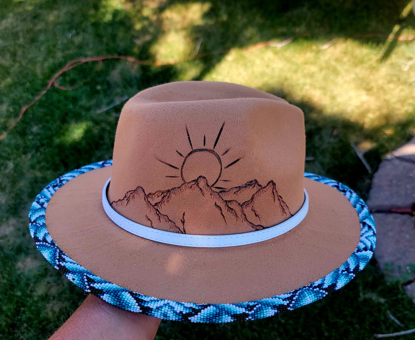 Excited to share my latest finished beaded hat. 
Take me to the mountains! 
Handbeaded brim with approximately 20 hours of beading. 😍🤩
Teal / blues but available in any custom ordered colors. 
$200.00 plus shipping 
Hat and matching earrings $240.00

#f