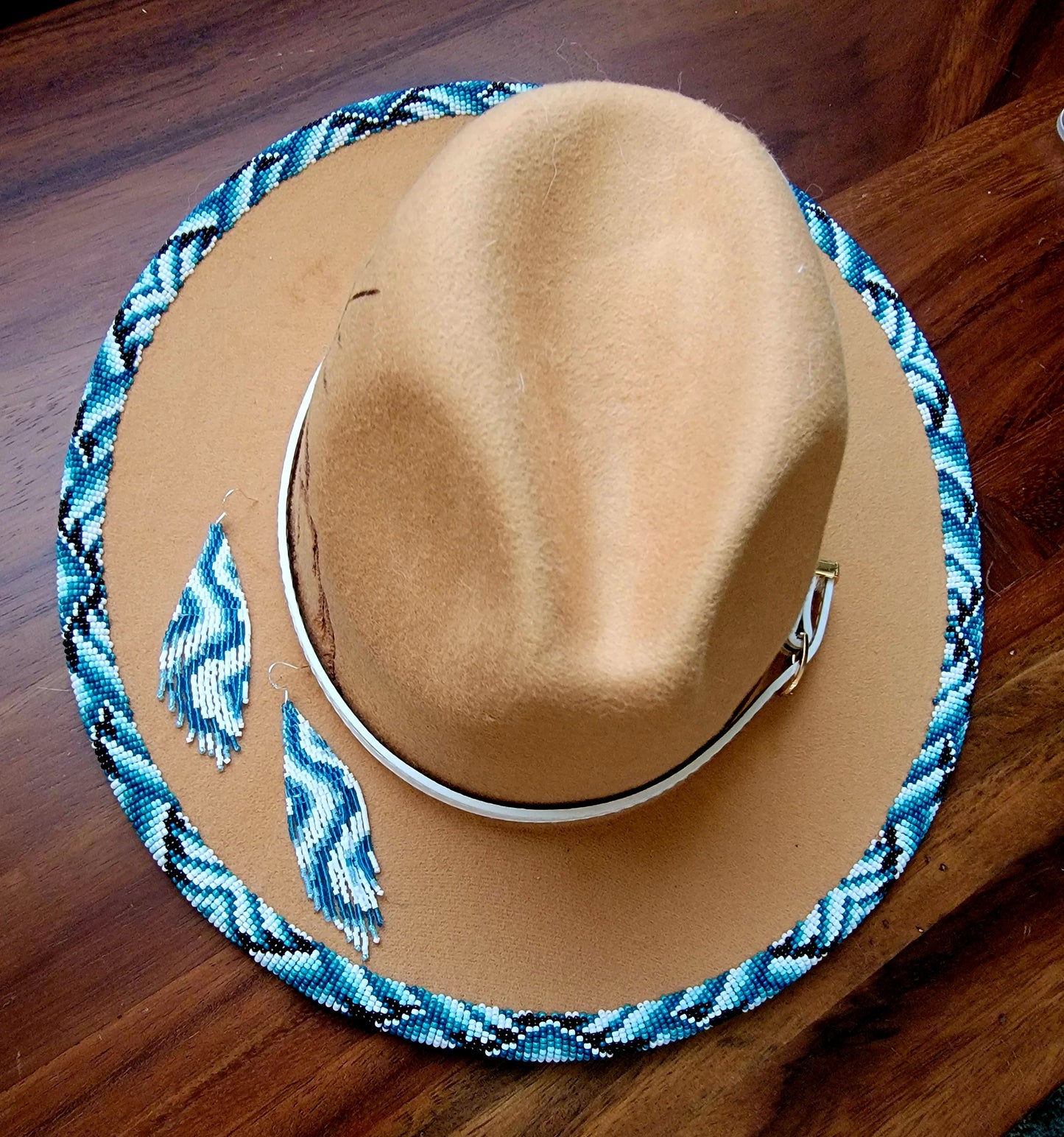 Excited to share my latest finished beaded hat. 
Take me to the mountains! 
Handbeaded brim with approximately 20 hours of beading. 😍🤩
Teal / blues but available in any custom ordered colors. 
$200.00 plus shipping 
Hat and matching earrings $240.00

#f