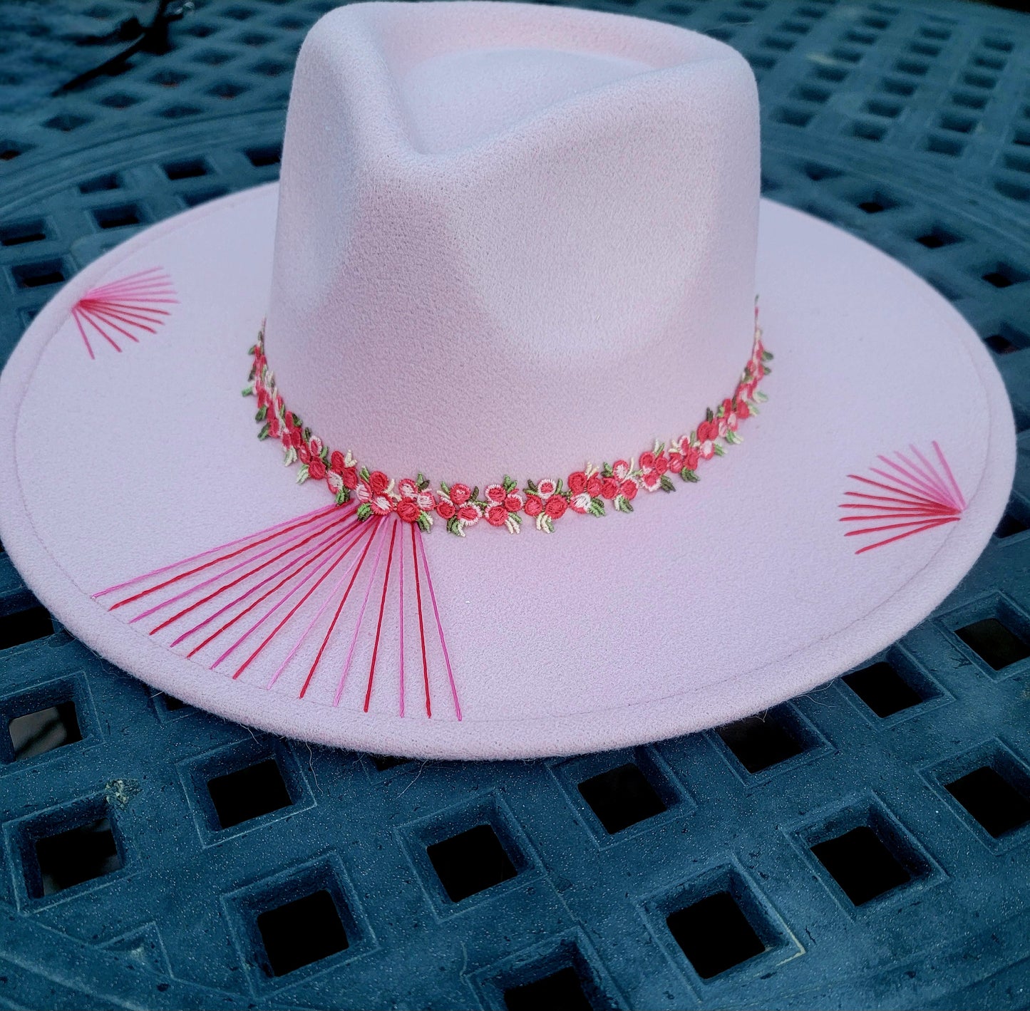 Pretty in Pink. 🩷 
Pink fedora hand embroidered with pink highlights. Pink floral band with butterfly pin accent on the back. 
$100. This would also make a cute mommy and mini set! #prettyinpink #pinkfedora #handembroideredfedora #pinkfedora